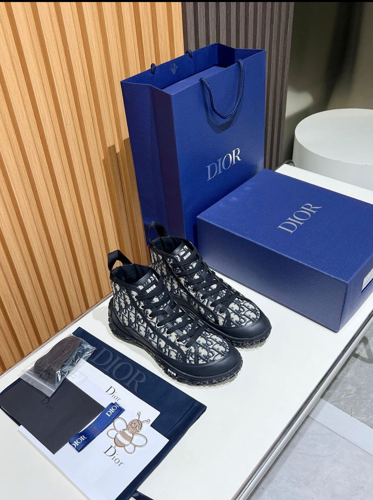 Dior B28 High-Top Sneaker in beige and black Dior Oblique jacquard