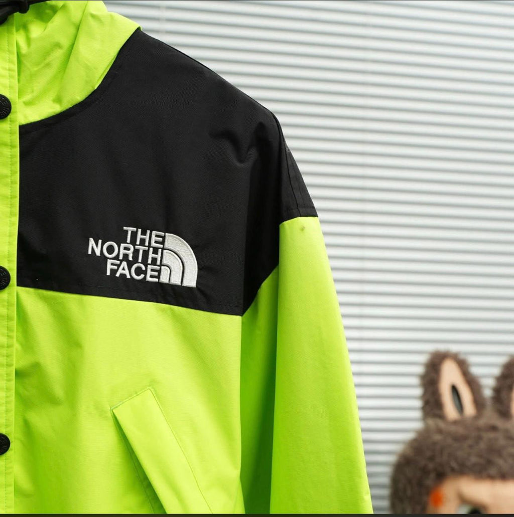 The North Face 1985 Seasonal Mountain Jacket in LED yellow/black