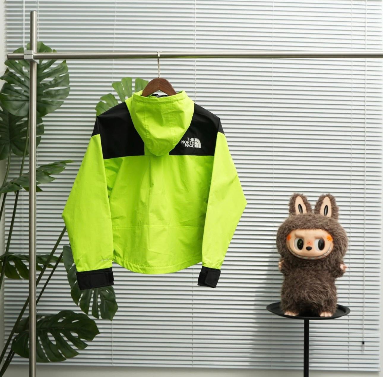 The North Face 1985 Seasonal Mountain Jacket in LED yellow/black