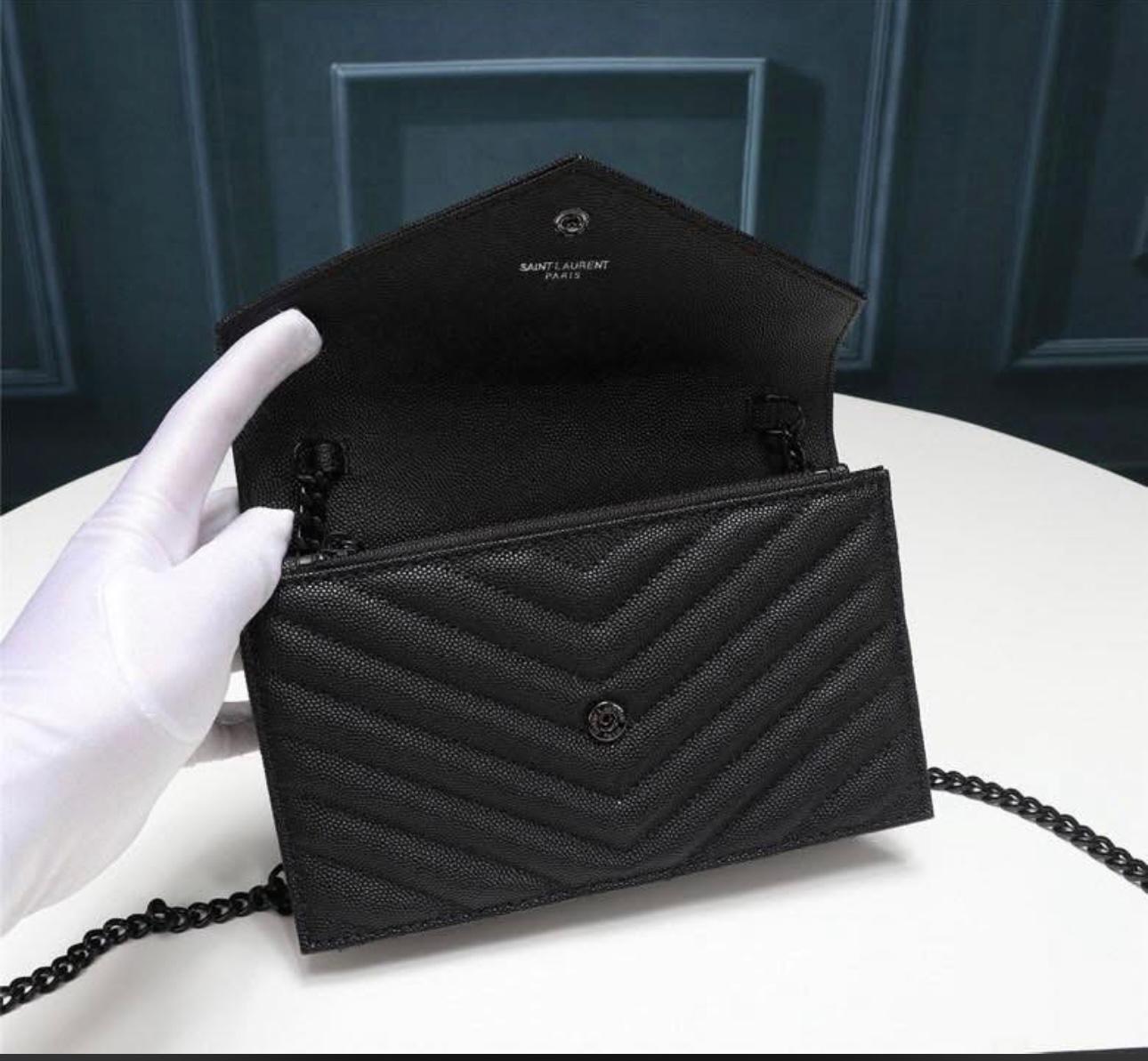 Saint Laurent Cassandre Envelope Chain Wallet in black grain de poudre leather