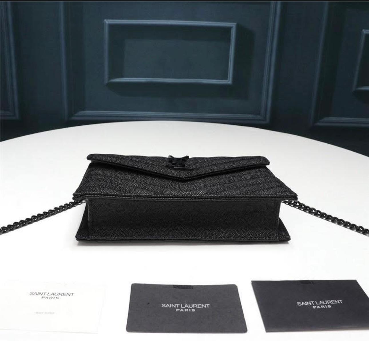 Saint Laurent Cassandre Envelope Chain Wallet in black grain de poudre leather