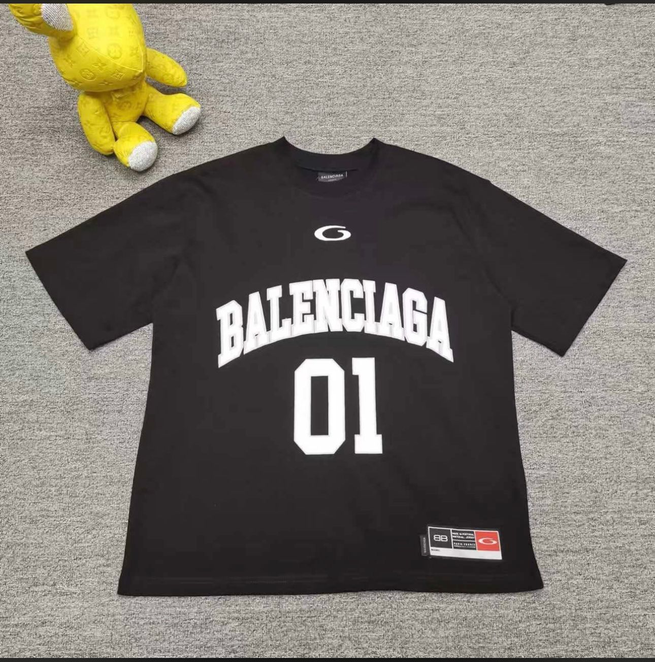 Balenciaga Basketball Series oversized t-shirt in black, blue, and white vintage jersey
