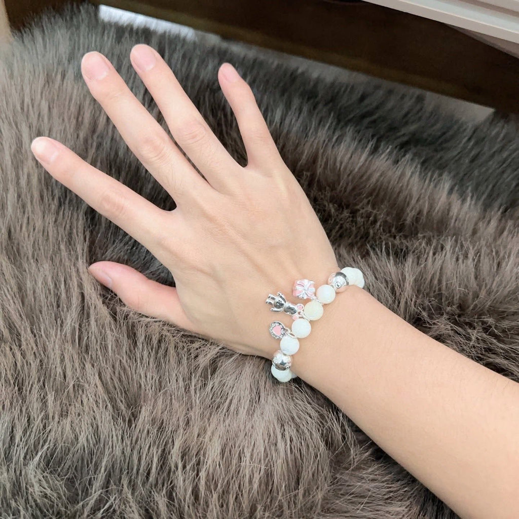 Tiffany & Co. 925 silver Ziegfeld white dolomite bracelet with additional charms