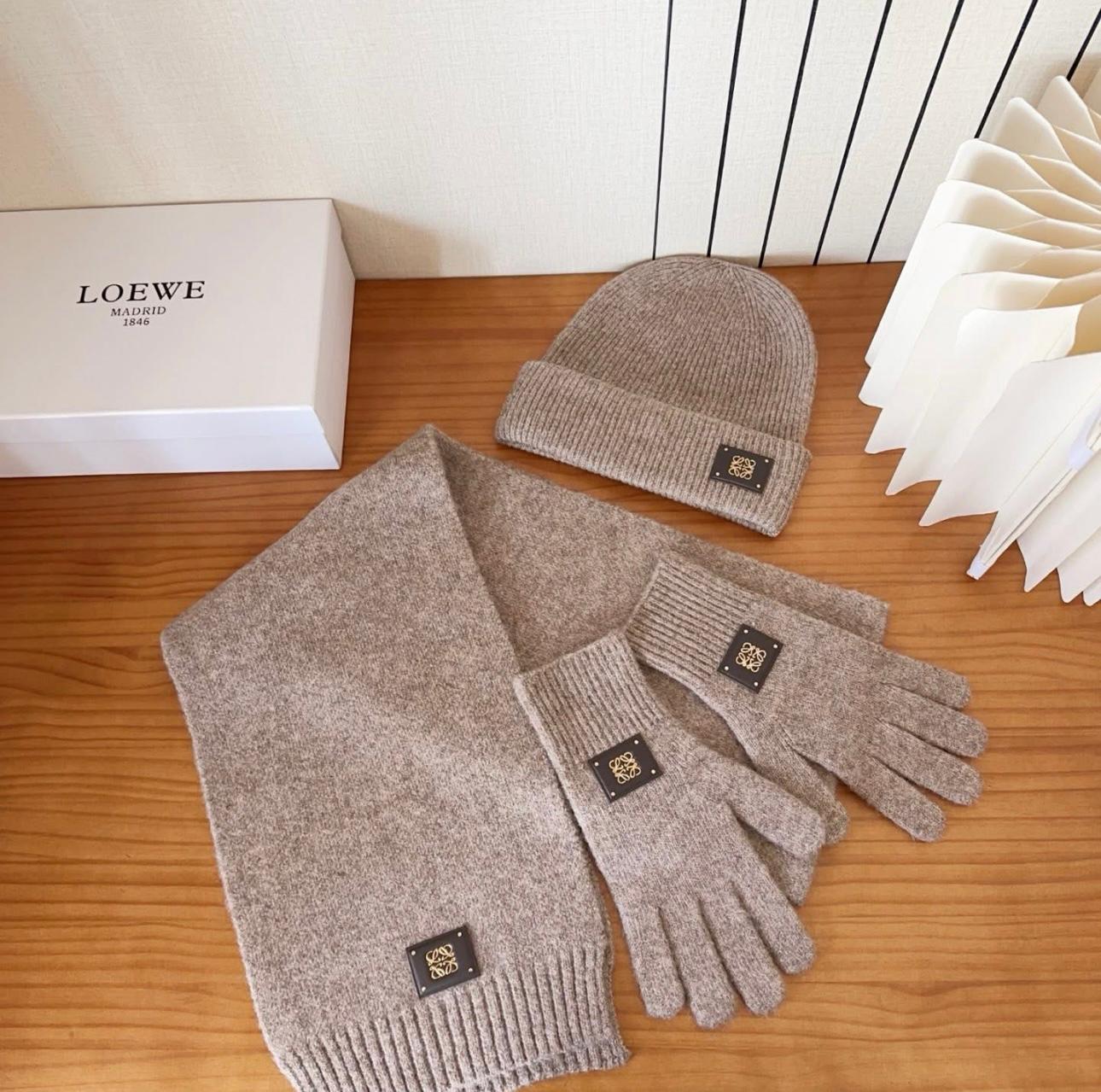 Loewe knit beanie, scarf, and gloves set in a light brown or beige